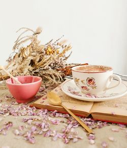 Close-up of pink roses on table