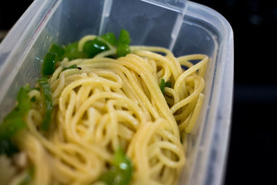 Close-up of spaghetti in container