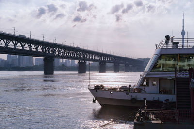 Bridge over sea against sky