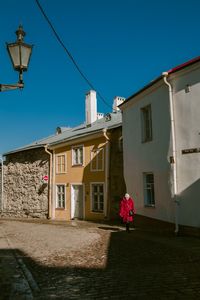 Low angle view of building against blue sky