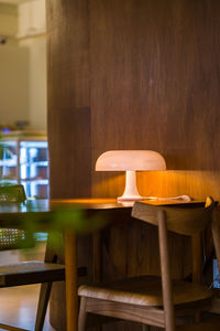 Close-up of empty chairs and table in restaurant