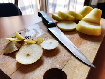 High angle view of fruits on cutting board