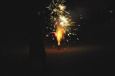 Firework display at night