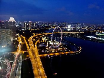 High angle view of illuminated city at night