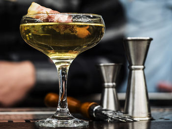 Close-up of beer glass on table