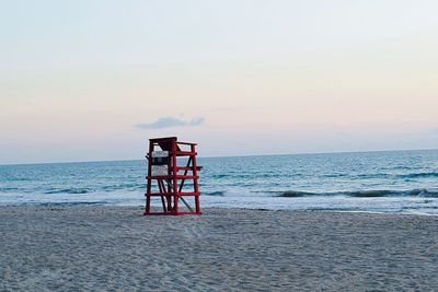 Scenic view of beach against clear sky