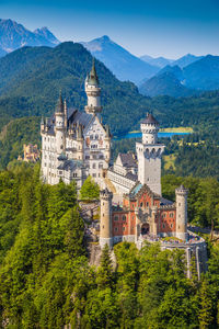 Buildings against mountain range