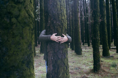 Man standing in forest