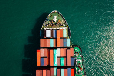  head shot from drone camera container cargo ship in import export business and industrial service 