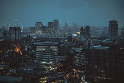 London illuminated by night against sky at night