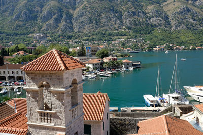 High angle view of buildings by sea