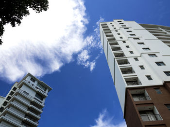 High-rise building and bright blue sky