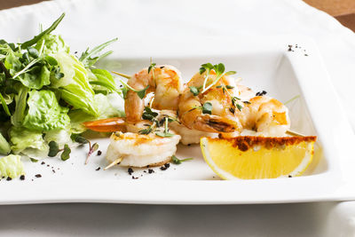 Close-up of food served on table