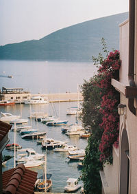 High angle view of sea and buildings against sky