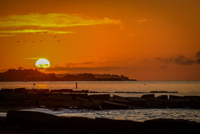 Scenic view of sea during sunset