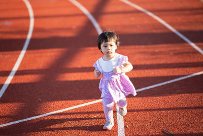 High angle view of girl running