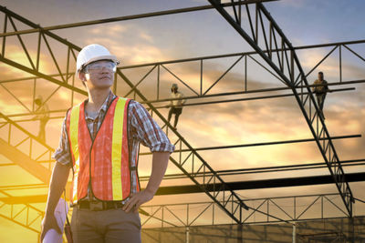 Portrait of man working at construction site