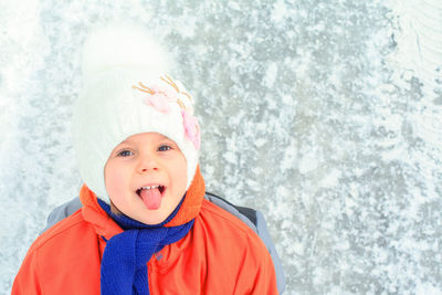 Portrait of cute girl in snow