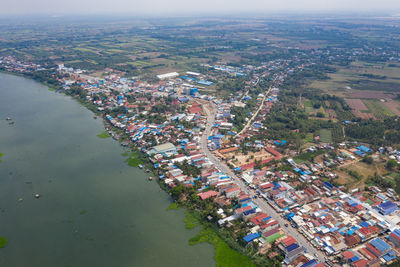 High angle view of river amidst buildings in city