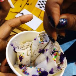 Close-up of hand holding ice cream