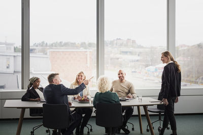 Business people having meeting in boardroom