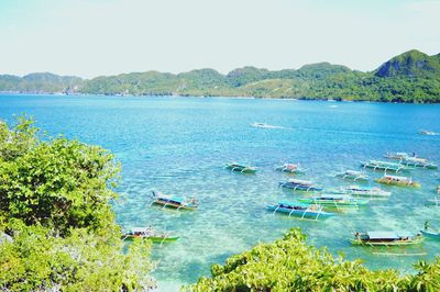 Scenic view of boats in sea