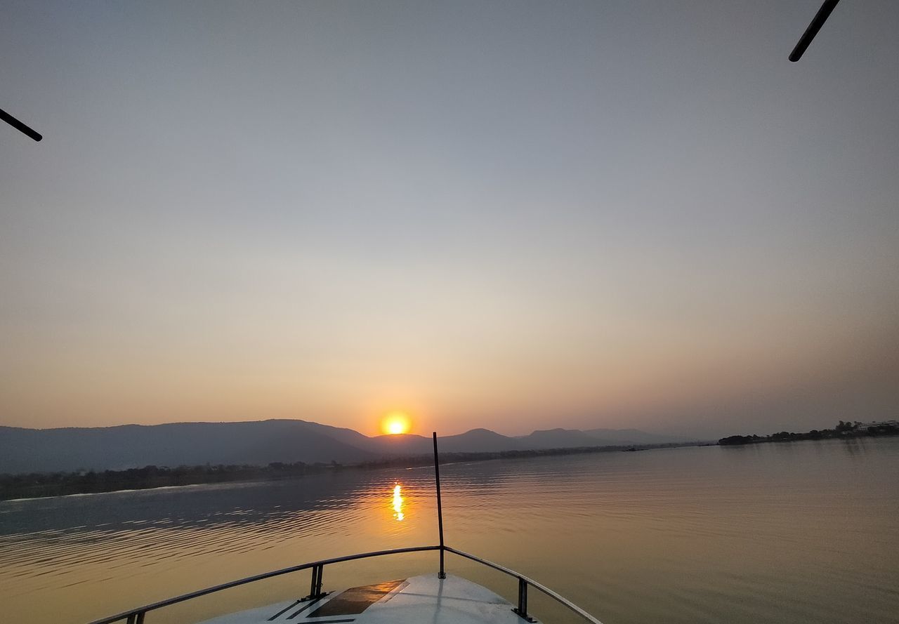 VIEW OF SWIMMING POOL AT SUNSET