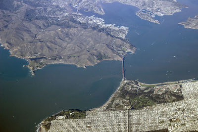 High angle view of sea and cityscape