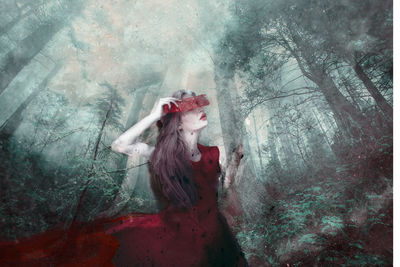 Digital composite image of woman in forest