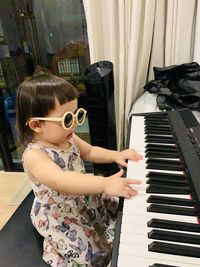 Portrait of woman playing piano