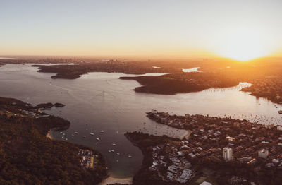 High angle view of buildings against sky during sunset