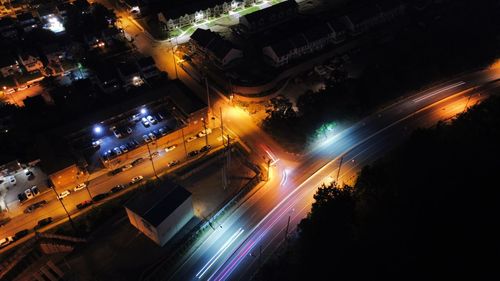 High angle view of light trails on street at night