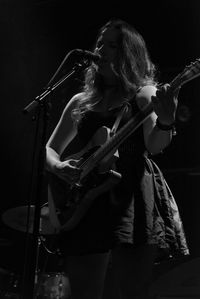 Young woman playing guitar