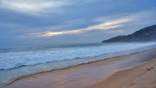 Scenic view of beach against sky
