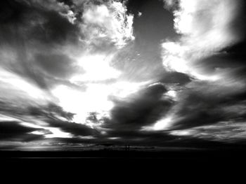 Scenic view of cloudy sky at sunset