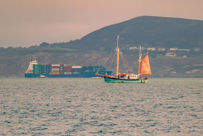 Yacht and ship in dublin bay
