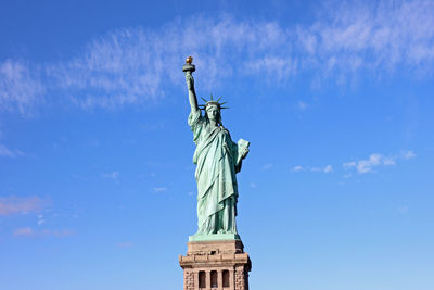 Statue of liberty front view blue sky