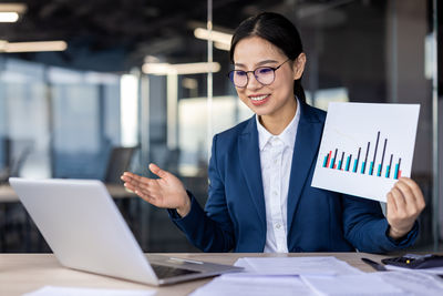 Portrait of businessman working at office