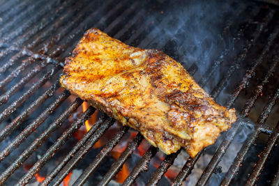 Close-up of meat on barbecue grill