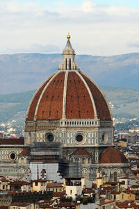 View of cathedral and buildings against sky