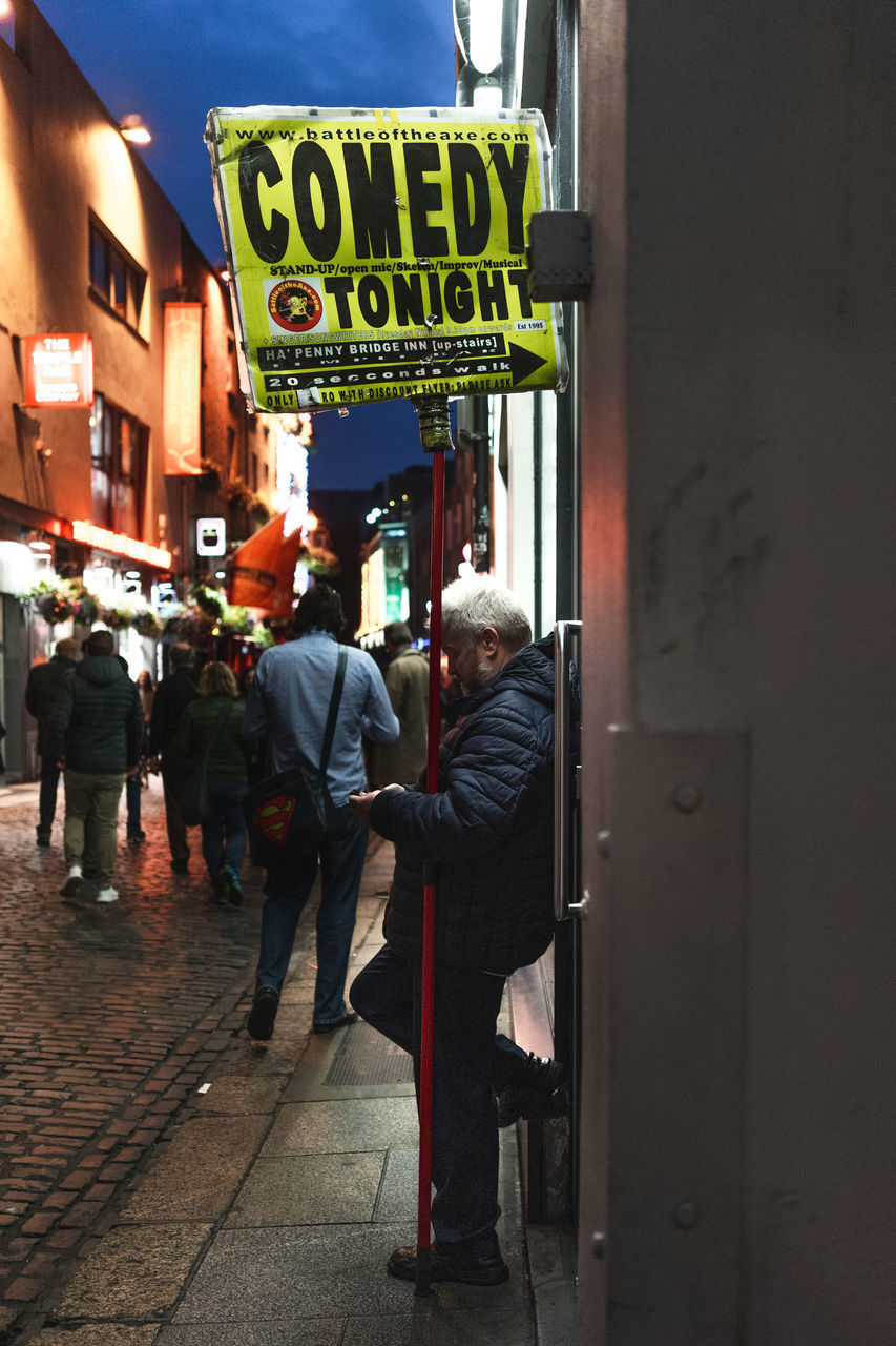 PEOPLE ON STREET AT MARKET