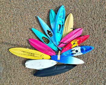 High angle view of multi colored kayaks 