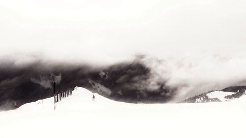 Snow covered mountain against sky