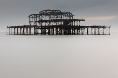 Lifeguard hut on sea against clear sky