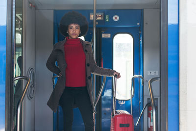 Elegant woman going for business trip on train