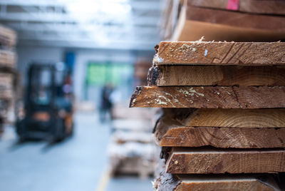 Close-up of stacked woods in factory