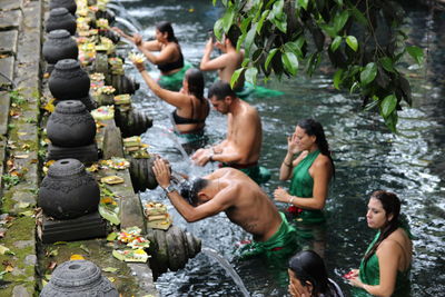 Group of people enjoying in water