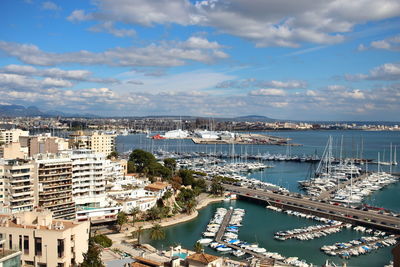 High angle view of boats moored at harbor