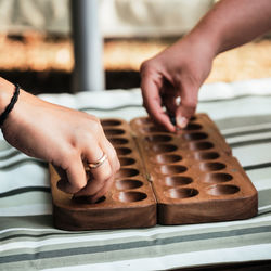 Close-up of people playing leisure games