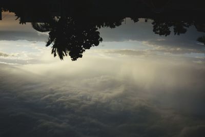 Scenic view of landscape against cloudy sky